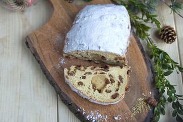 A traditional German Christmas fruitcake, with dried fruits and nuts. Homemade pastries for breakfast.