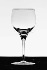 Empty crystal glass without reflections in the studio