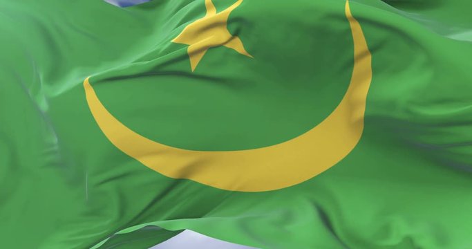 Mauritania flag waving at wind with blue sky in slow, loop