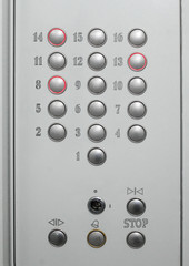 Closeup of a control panel with buttons in the lift cabin
