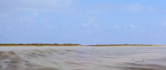 Sandverwehung am Strand
