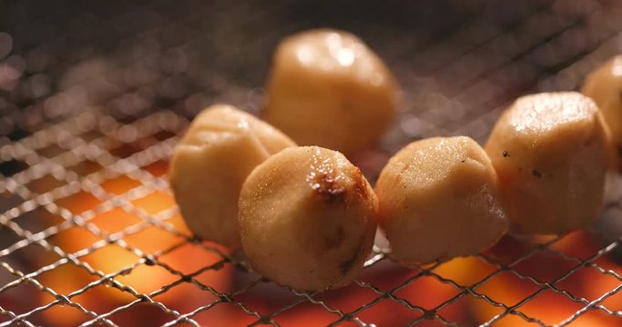 Fish ball on barbecue metal grill net