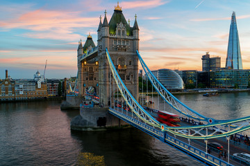 illuminated Tower Bridge during sunset © Simon