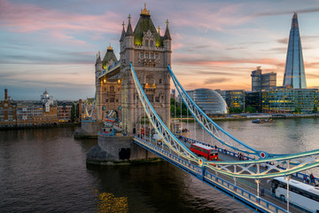 illuminated Tower Bridge during sunset