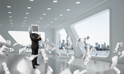 Businessman with monitor instead of head.