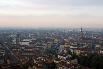 Fototapeta premium Verona's cityscape early in the morning. Roofs and buildings of the old Italian city.