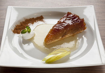 apple pie served on a table in a restaurant