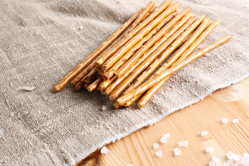 Fototapeta na wymiar sticks bread salted on a wooden