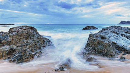 Rocky Overcast Dawn Seascape