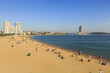 Qingdao city building and beach sea