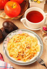 Italian pasta - farfalle with chicken and tomato sauce  
