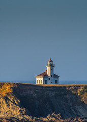 Fototapeta na wymiar Cape Arago Lighthouse and Blue Sky