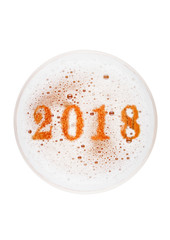Glass of lager ale beer top with 2018 year digits