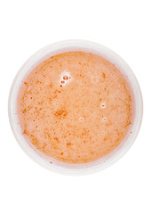 Glass of lager ale beer top view with foam