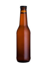 Brown glass beer bottle with black cap isolated
