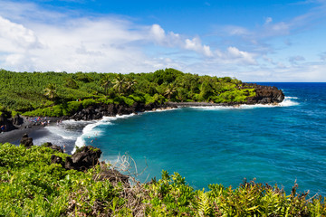 Scenic landscape view of Black Sand Beach in the early summer months