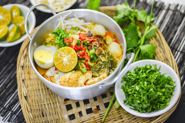 Hot and spicy curry noodle on the table. Curry noodle is a one of the popular foods in asia.