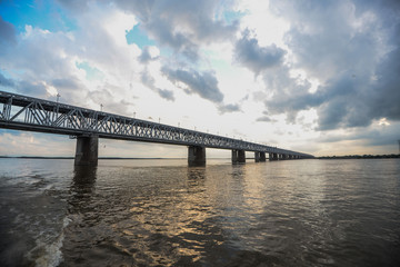 Fototapeta na wymiar Khabarovsk Bridge is a road and rail bridge, which crosses the Amur River in Khabarovsk city