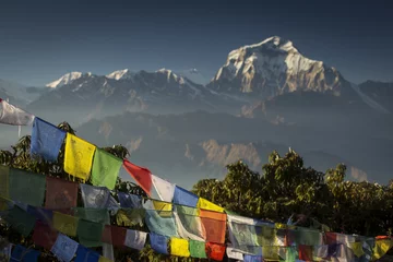 Tableaux ronds sur plexiglas Dhaulagiri Bhuddism flags with Dhaulagiri peak in background at sunset in Himalaya Mountain, Nepal.