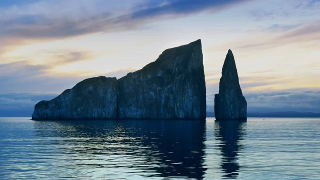 sunrise from a boat at leon dormido near san cristobal in the galapagos islands, ecuador