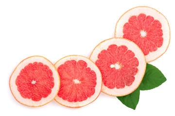 Naklejka na ściany i meble Grapefruit slices with leaves isolated on white background with copy space for your text. Top view. Flat lay pattern
