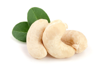 cashew nuts with leaf isolated on white background. macro