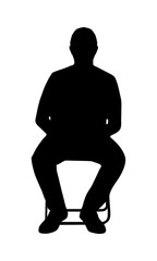 Silhouette of a sitting man on chair