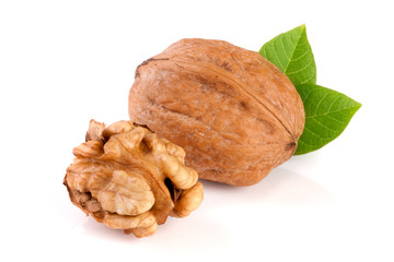 Walnuts with leaf isolated on white background