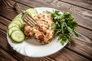 Pork chop with cheese and red pepper