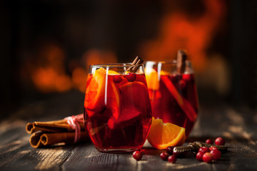 Mulled wine with orange and a cranberry