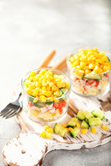 Salad with crab sticks,  corn and fresh cucumber