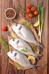 raw fish dorado and ingredient