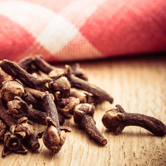 Spice cloves on kitchen table