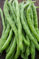 Organic Green Vegetable Cordyceps, which are vegetarian vital vitamins, beans on the wood tabletop,
