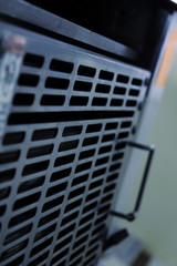 Metallic grid the door of industrial machine