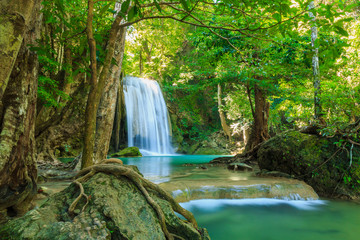 Beautiful Erawan waterfall with sunlight  in the morning , Kanchanaburi Province, Thailand.