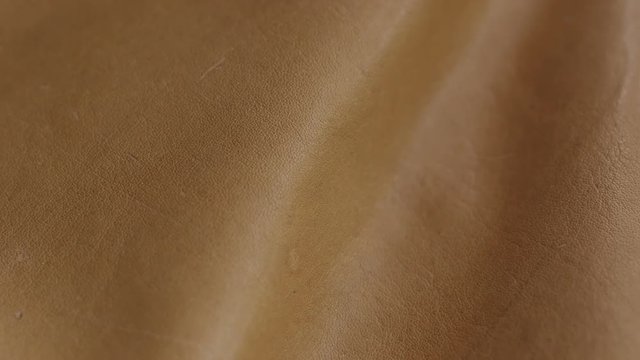 Natural brown leather texture background. Abstract vintage cow skin backdrop design.