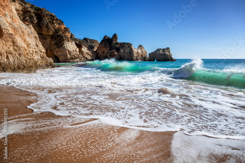 Algarve Portugal A Stunning Sea Ocean Landscape With Yellow Rocks And Azure Water The Beauty Of Nature And The Power Of The Ocean Wall Mural Olezzo
