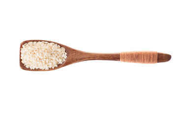 spice sesame seed in  wooden spoon isolated on a white background, top view