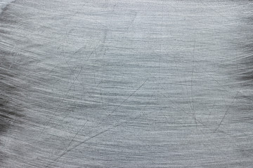 Metal wall background, texture of iron sheet with glitter and scuffs