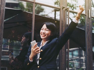 Happy Young Asian women in business concept .