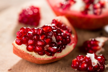 Pomegranate on wooden background