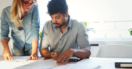 Portrait of architects having discussion in office