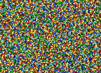 Colorful pills capsules background. Medicines background pattern texture