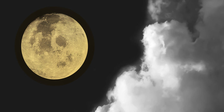 Dramatic atmosphere panorama view of night sky background with beautiful super moon and clouds.Image of moon furnished by NASA.