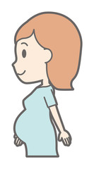 A pregnant woman in green's clothes is walking sideways