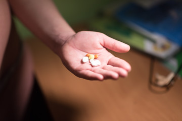 Medicine pill in hand