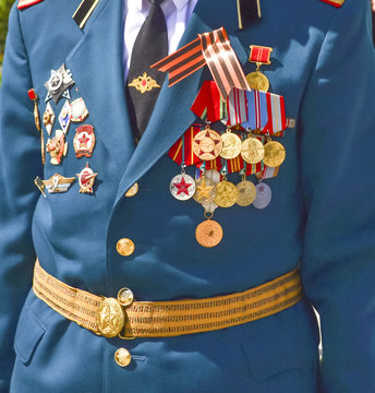 A veteran soldier decorated with medals the celebration of the Victory Day