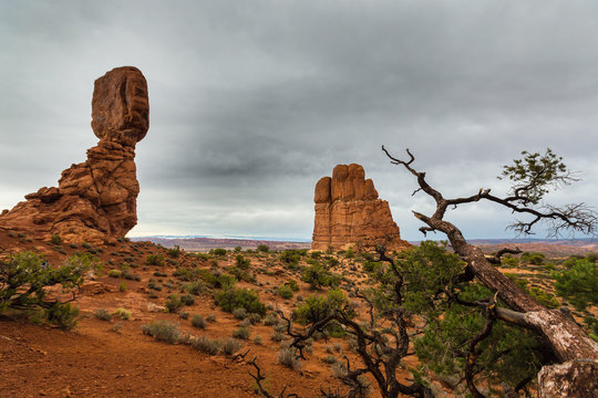 Balanced Rock, Arches National Park, Utah, profiled on stormy sky