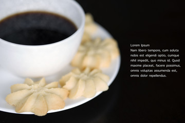 Cup of espresso coffee with butter cookies and space for text